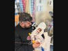 Dad Evan Mager holds his daughter at about four weeks old.