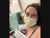 Mother Colleen Mager holds her daughter at about two weeks old.