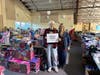 Middletown Helps Its Own volunteers Sharon Copeland and Jeanette MacDonald helping to pick out toys.