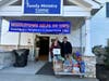 Middletown Helps Its Own Britney, Keith and Brian help bring IMA’s donated toys into New Monmouth Baptist Church, a collection site.