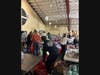 Volunteers sorting and loading donations at New Monmouth Baptist Church.