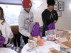 Filling the bags inside the Harmon Cove clubhouse.