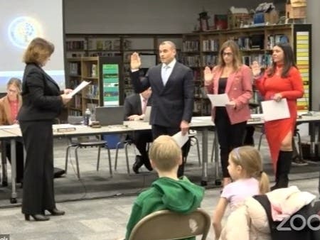 Frank Capone, Catarina Skalaski and Jacqueline Tobacco take the oath of office Wednesday night.
