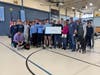 The $27,000 will go to purchase service dogs for injured U.S. soldiers who have PTSD and traumatic brain injuries.