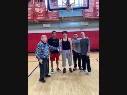 Evanson presented Frostbite with the winning trophy. It's a team of all Secaucus guys, led by captain Mike Halevi.