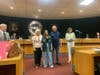 Sydney Millevoi with her grandparents.