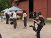 Dan Levy and Taylor Ortega on set at Fosterfields Living Historical Farm in Morristown.
