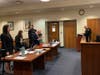 Assistant Middlesex County Assistant Prosecutor Erin Campbell, standing at left, speaks to the judge while Alonso is seated with his public defender, standing to his right.