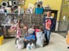 Kyle Stradford dropped off the donations at the Secaucus Animal Shelter Saturday with Mayor Mike Gonnelli.
