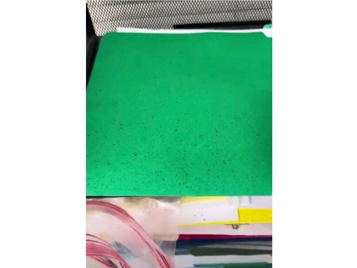 Black dust particles that fell from an HVAC unit onto a teacher's desk directly underneath it at Bayview Elementary School in April. The teacher's eye was irritated by the black particles, the mom says.