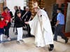 Bishop Michael Saporito greeted worshippers following the Memorial Day Mass at Maryrest Cemetery in Mahwah.