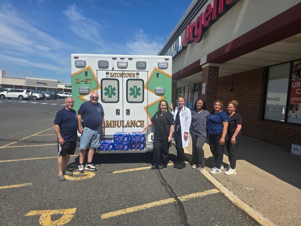 Eatontown EMS picking up bottled water donations from IMA Urgent Care.