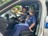 Cub Scouts got to turn on the lights and sirens, and use the loudspeaker.