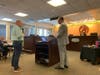 From the June 11 hearing: A lawyer for Hartz Mountain, at right in grey, questions a man who works for QuickChek corporate.