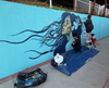 Local Perth Amboy artist Julisa Mugica works on the new mural she's painting along the waterfront.