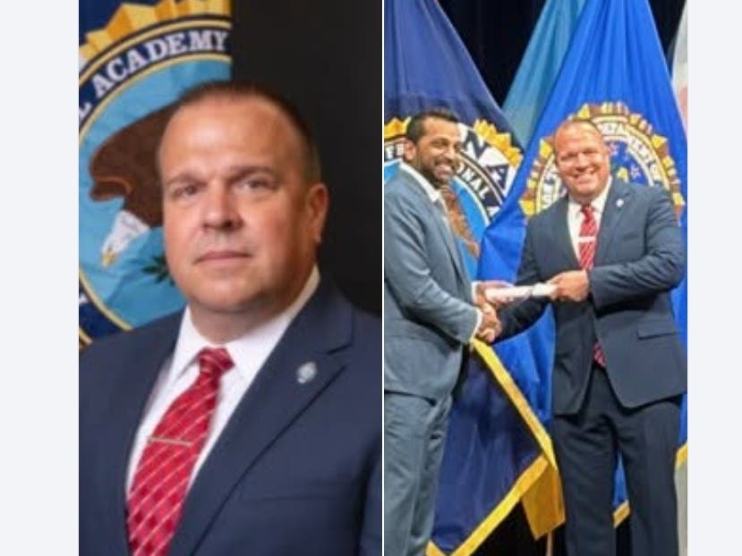 Middletown Police Lieutenant Christopher Dee shakes hands with FBI Director Kash Patel at the June 18 graduation.