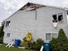 The lightning hit at the very peak of the attic and roof, said a neighbor.
