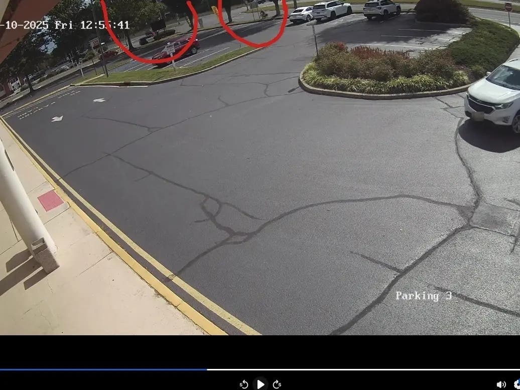 The marked Atlantic Highlands Police patrol car is circled in red at left, as is the e-bike rider, who was headed south on Rt. 36 north on Oct. 10, 2025 in Middletown.