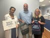Ocean Avenue School principal Leone picking up school supplies from IMA Urgent Care Middletown in 2025.