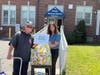 Ocean Avenue School in Middletown’s school secretary, Wendy Dunleavy, and custodian Pat with donations.