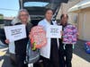 IMA Urgent Care Middletown’s office manager Tina, Dr. Ibrahim, and medical assistant, Sharra loading donations.