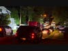 The scene outside the home on Douglas Street Wednesday night in Woodbridge.