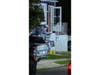 People enter the home wearing hazmat suits and face coverings, to remove the dead animals.