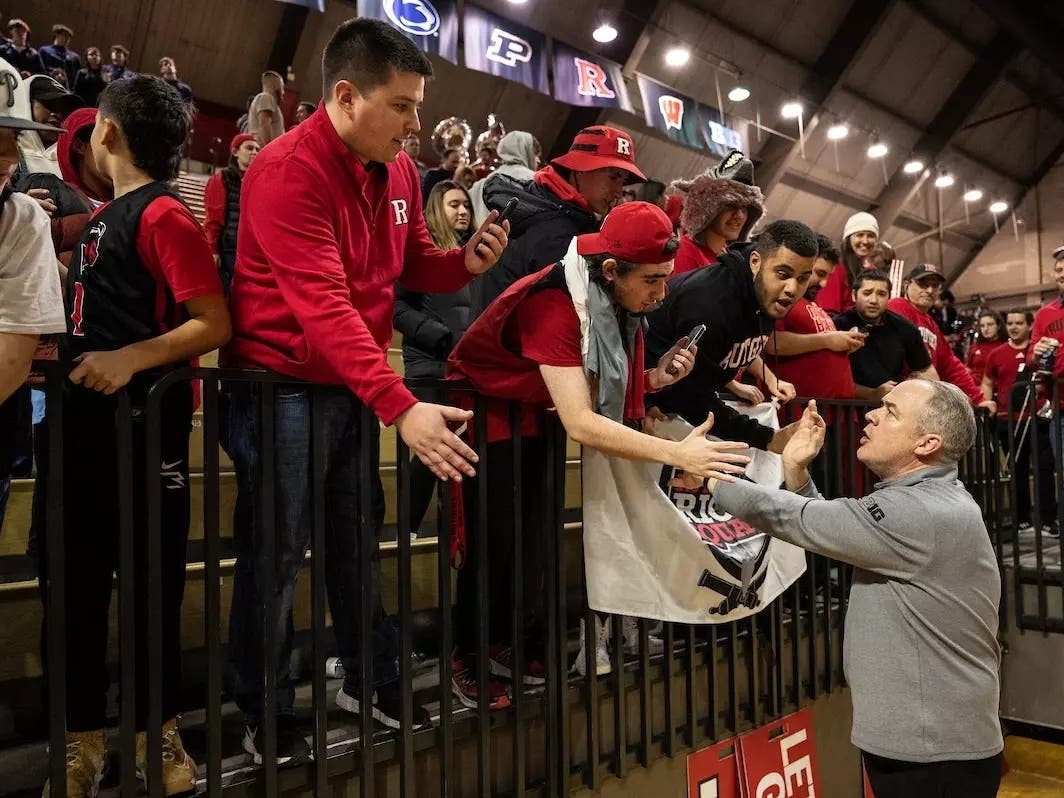 Steve Pikiell has 161 wins under his belt as Rutgers' head men's basketball coach. He is pictured here greeting fans.