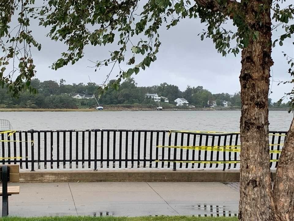 Two of the sailboats that washed ashore in Cliffwood Beach. Photo taken Monday from the Keyport waterfront.