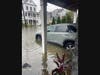 The groom, Francisco Vasquez, was unable to get to the wedding because this was their car, driveway and street Saturday.