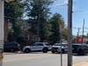 SWAT officers are seen outside the man's window as of 12:20 p.m. Wednesday.