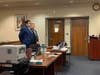 Joshua Kohut, at right, listens while his attorney speaks Thursday in Middlesex County Superior Court.