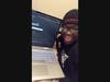 TC Williams 10th grader Amy Akintola-Samuel proudly shows off her laptop awarded to her from the Project Discovery of Alexandria Resiliency Fund