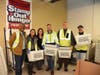 Managers from New York & Atlantic Railway join Island Harvest at the food sorting event in Hauppauge