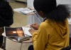 AACPS Students workshop their own writing in a LitCon break-out session
