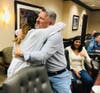 Mark Connors hugs Danielle Minett, MD, emergency room physician