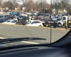 A car lost control on Route 22 and hit a retaining wall before flipping over and landing onto a parked car in Costco.