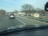 A car lost control on Route 22 and hit a retaining wall before flipping over and landing onto a parked car in Costco.