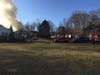 Firefighters battled a house fire Thursday morning in Warren.