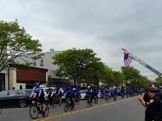 Police Officers biked through Somerville on Thursday afternoon in honor of those who have died in the line of duty.
