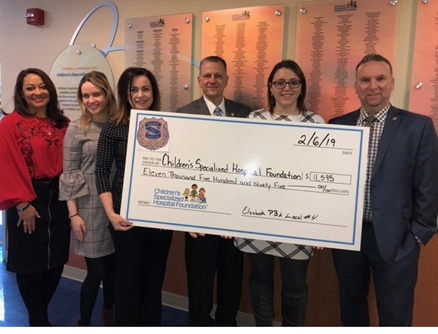 The Mills at Jersey Gardens and the Elizabeth Police Benevolent Association’s Local #4 presented a $11,595 donation to Children’s Specialized Hospital following the 2018 race.