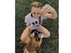 Maddie Schmelzer with her rescue boxer mix, Addy.