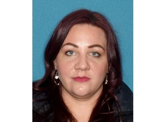 A Hillsborough mother of three was charged after police say she deliberately set fire to her township apartment last week, Somerset County Prosecutor Michael H. Robertson announced Monday.