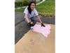 Watchung Hills Regional High School Freshman Sami Traister is busy tie-dying groovy clothing to donate profits to the Children's Hospital of Philadelphia amid the new coronavirus.
