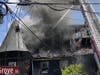 A three-alarm house fire that hospitalized two men remains under investigation by the Somerset County Prosecutor's Office.