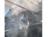 A three-alarm house fire that hospitalized two men remains under investigation by the Somerset County Prosecutor's Office.
