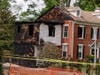 Authorities are questioning a person in connection with a "suspicious" fire that damaged three homes and displaced two families on Wednesday morning in North Plainfield, Somerset County Prosecutor Michael H. Robertson said.