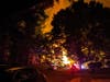 Authorities are questioning a person in connection with a "suspicious" fire that damaged three homes and displaced two families on Wednesday morning in North Plainfield, Somerset County Prosecutor Michael H. Robertson said.