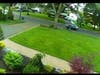 Police released two photos of a wanted person and a vehicle in connection with the burglaries.