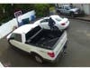 Police released two photos of a wanted person and a vehicle in connection with the burglaries.